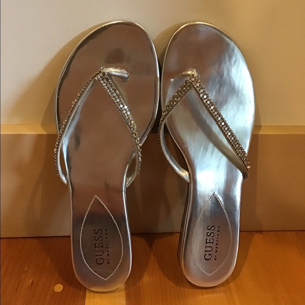 Guess brand metallic silver fancy flip flops